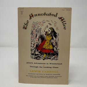 The Annotated Alice paperback with both Alice’s Adventures in Wonderland and Through the Looking Glass by Lewis Carroll