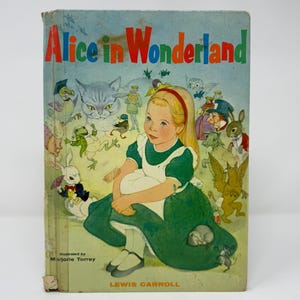Alice in Wonderland by Lewis Carroll Illustrated by Marjorie Torrey