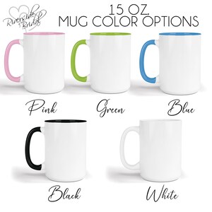 May include: Five 15 oz. white ceramic mugs with different coloured rims and handles. The mugs are arranged in a row, with the colours pink, green, blue, black, and white.