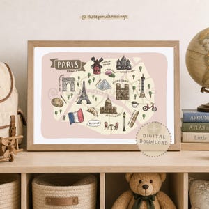 Könnte beinhalten: Ein gerahmter Druck mit einer handgezeichneten Karte von Paris, Frankreich, mit Illustrationen berühmter Wahrzeichen wie dem Eiffelturm und Notre Dame. Die Karte ist in Rosa- und Beigetönen gehalten, mit dem Text "Paris" und "France". Der Text "Digital Download" ist ebenfalls sichtbar.
