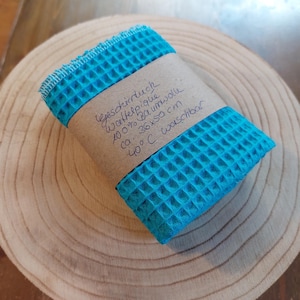K&ouml;nnte beinhalten: Ein blaues Waffeltuch aus 100 % Baumwolle. Das Tuch ist ca. 36 x 50 cm gro&szlig; und bei 40 Grad Celsius waschbar.
