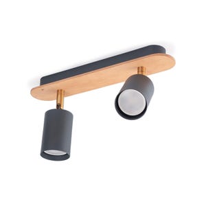 May include: A modern ceiling light fixture with two adjustable spotlights. The fixture features a wooden base with a dark gray top and two cylindrical spotlights in a matching gray color. The spotlights are mounted on brass-colored stems.