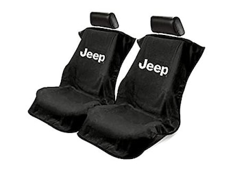 May include: A pair of black automotive seat covers featuring the white Jeep logo printed on the upper backrest area. Each cover includes a separate black headrest cover, designed to fit over standard vehicle seats with a contoured shape.