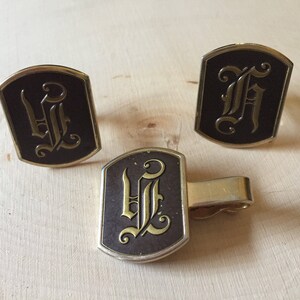 Swank calligraphy cuff links and tie bar/clip. Letter H