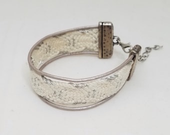 White and metallic silver bracelet created with a vintage, silk kumihimo obijime tie and leather cord