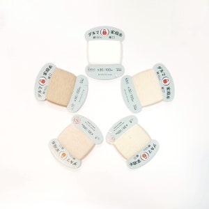 Daruma #30 weight hand stitching thread - Off-White and natural Beige hues - 100 meter skein