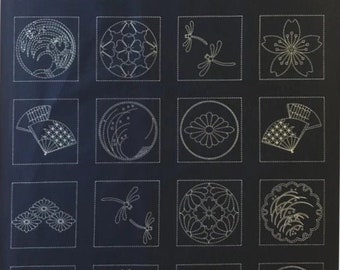 Sashiko pre-printed wash-away pattern sampler panel - Japanese crests and traditional designs on dark navy