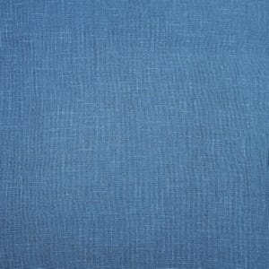 May include: A close-up shot of a textured, solid blue fabric. The fabric has a woven appearance with visible threads and a slightly uneven surface. The color is a medium shade of blue, with subtle variations in tone.