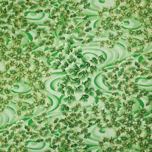 以下が含まれることがあります： 金箔のスタイリッシュな葉と花が繰り返されるパターンが施された緑色の生地。そのパターンは日本の芸術を彷彿とさせる。