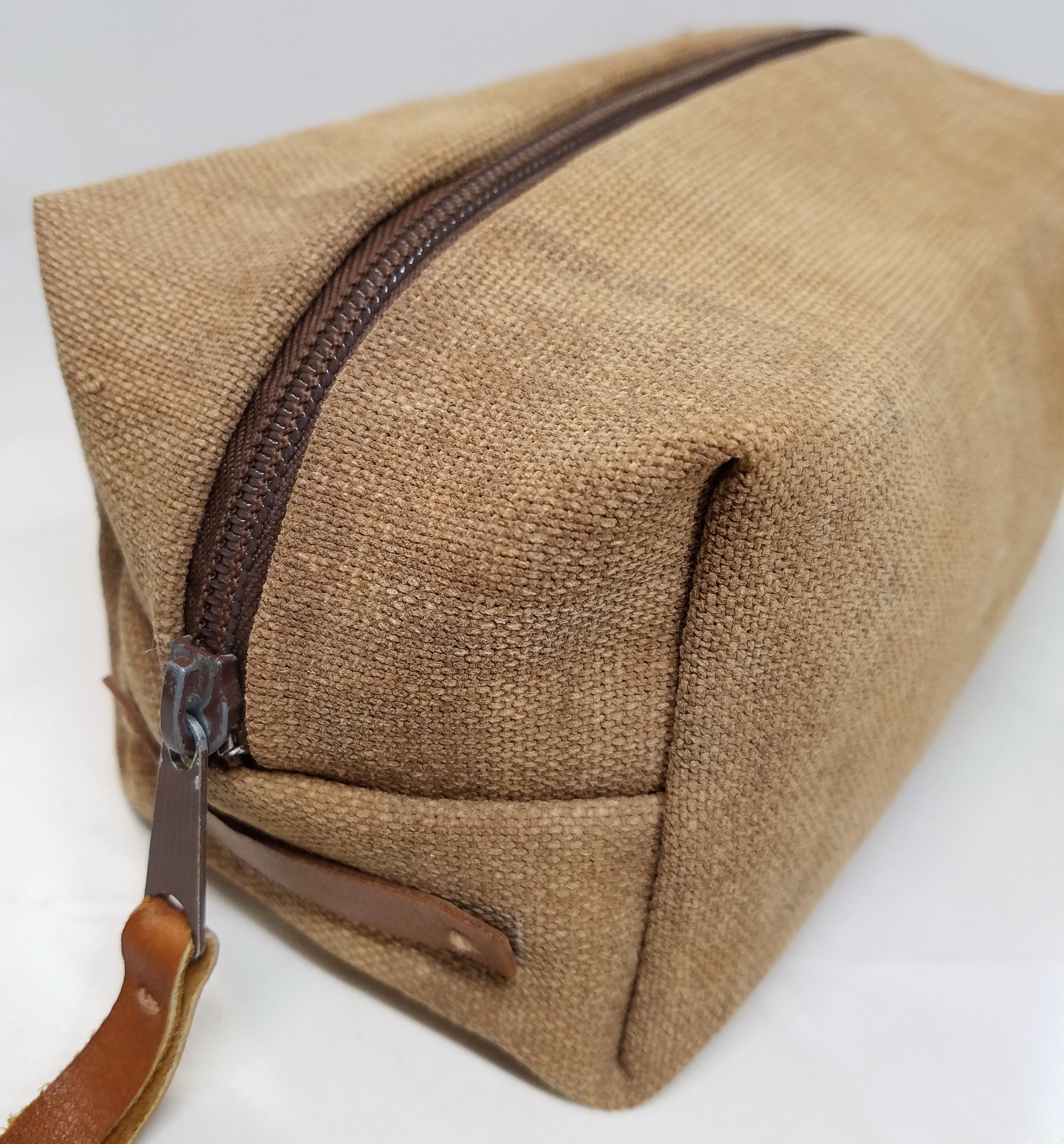 Men's dopp travel bag created with antique sakabukuro kakishibu dyed canvas