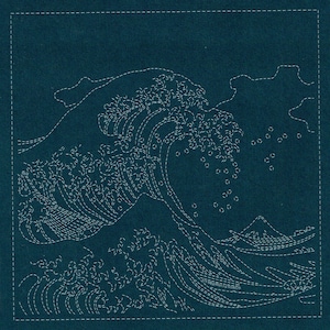 May include: A square, teal fabric panel featuring a white, embroidered depiction of Hokusai's "The Great Wave off Kanagawa." The design shows a large wave, boats, and Mount Fuji in the background, all rendered in detailed stitching.