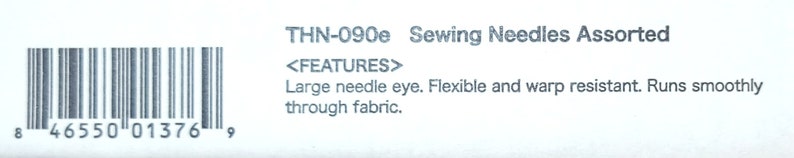 May include: A barcode label for sewing needles. The label reads "THN-090e Sewing Needles Assorted" and lists features: "Large needle eye. Flexible and warp resistant. Runs smoothly through fabric."