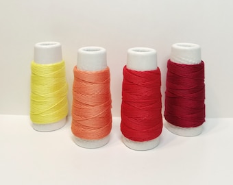 Lecien Cosmo Hidamari sashiko thread - Yellow and Red hued solid colors - 30 meter skein