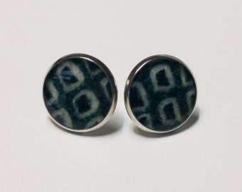 Silver toned stainless steel stud earrings with deep green and white colored shibori kimono fabric