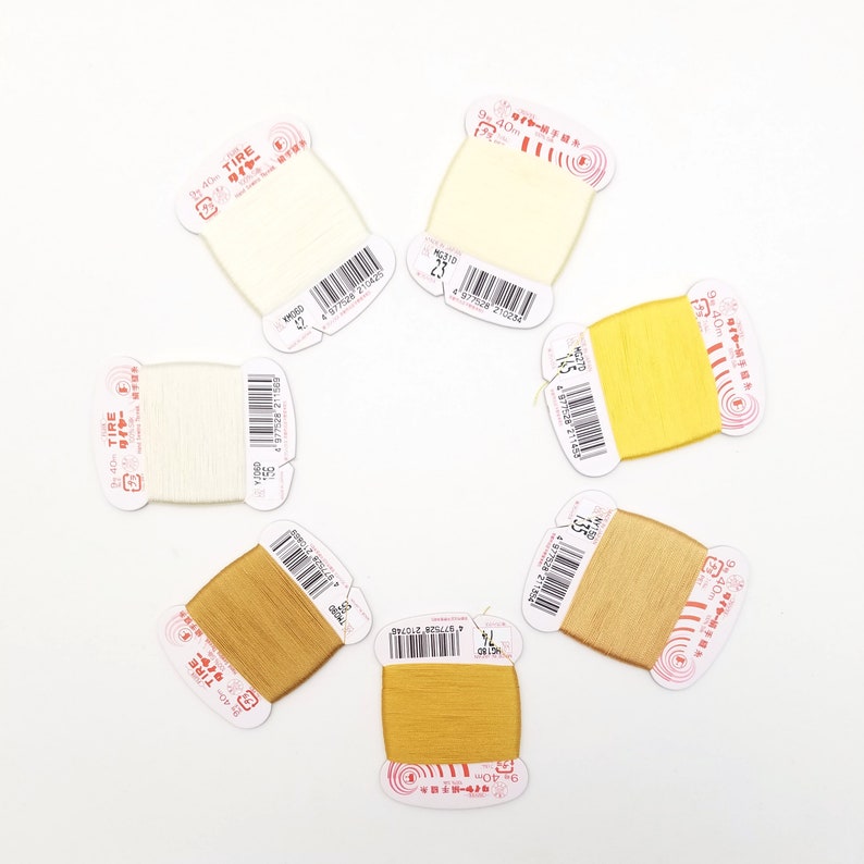 Fujix Tire silk #9 hand sewing thread - cream and golden colors image 1