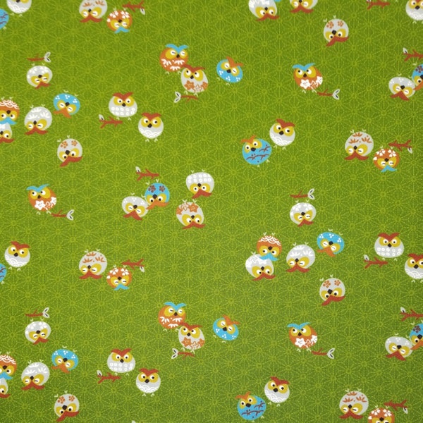 Yamaoka Japan colorful owls over green cotton fabric