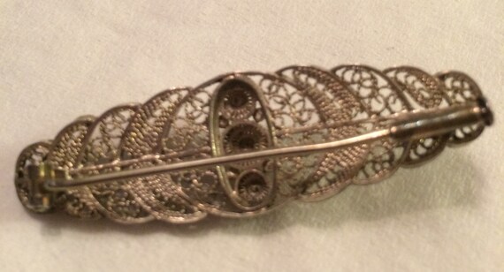 Early 1900's Silvertone Filigree Brooch with Tube… - image 3