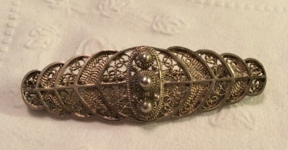 Early 1900's Silvertone Filigree Brooch with Tube… - image 1