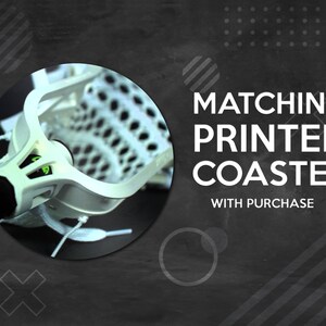 May include: A white lacrosse stick head with a black handle is featured in a circular image. The text "MATCHING PRINTED COASTER WITH PURCHASE" is displayed in white on a dark background.