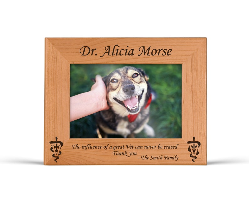 May include: A wooden picture frame with a photo of a dog and the text "Dr. Alicia Morse" and "The influence of a great Vet can never be erased. Thank you - The Smith Family".