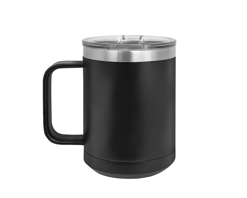 May include: A matte black stainless steel travel mug with a sturdy black handle and a clear, transparent plastic lid. The top rim of the mug features a polished silver-colored metal band, providing a clean contrast to the dark, solid-colored body.