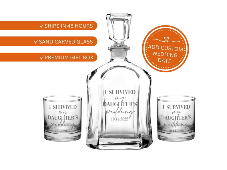 May include: A clear glass decanter with a faceted stopper and two matching lowball glasses. Each piece features the sand-carved text I SURVIVED my DAUGHTER'S wedding 10.14.2022. The set is presented as a collection of three distinct glass items.
