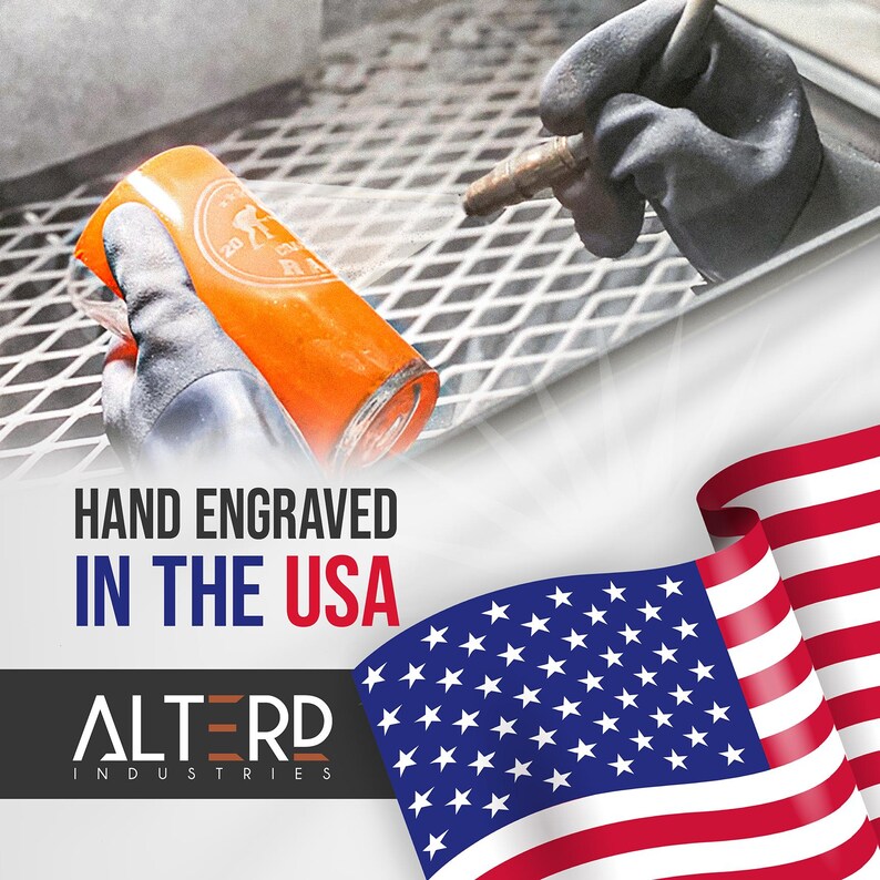 May include: A close-up of a hand wearing a black glove holding an orange glass with a design on it. The glass is being sandblasted with a tool. The image has the text "HAND ENGRAVED IN THE USA ALTERD INDUSTRIES" and a waving American flag.