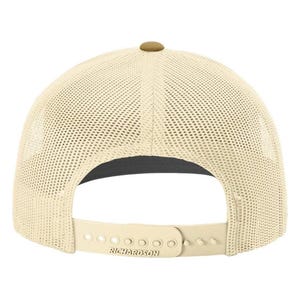May include: A beige mesh trucker hat with a brown button on top. The hat has a black underside and a brown adjustable strap with the word "RICHARDSON" printed on it.