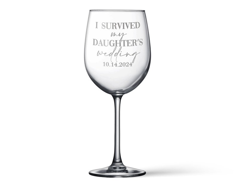 May include: A clear glass wine glass featuring the etched text I SURVIVED my DAUGHTER'S wedding 10.14.2024. The stemware has a rounded bowl, a slender stem, and a circular base, with the lettering displayed in a mix of block and script fonts.