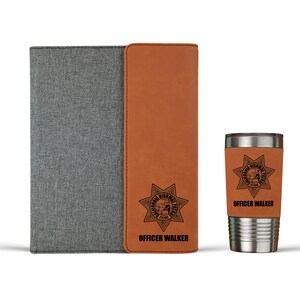 May include: A brown leatherette journal with a gray fabric cover and a matching brown leatherette tumbler with a laser engraved California Highway Patrol badge and the text "OFFICER WALKER".