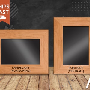 May include: Two wooden picture frames, one landscape and one portrait, on a woodgrain surface. The landscape frame is labelled "Landscape (Horizontal)" and the portrait frame is labelled "Portrait (Vertical)".