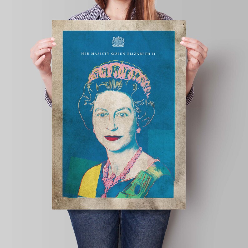 May include: A vintage-style poster featuring a pop art portrait of Queen Elizabeth II. The poster has a blue background with a yellow and green sash and a pink crown. The text "HER MAJESTY QUEEN ELIZABETH II" is at the top of the poster.