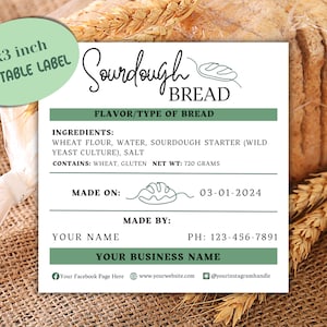 May include: A 3x3 inch printable label for sourdough bread. The label is green and white with the text "Sourdough Bread" in cursive. The label includes the ingredients, net weight, date made, and contact information.