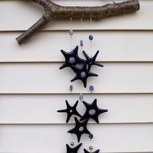 Handcrafted fused glass patriotic stars and stripes wind chimes in midnight blue metallic.  garden art, fairy garden housewarming.