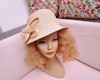 Old, light raffia hat