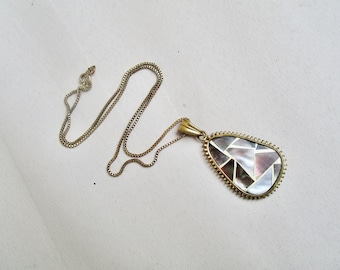 Original 50s brass chain with mother-of-pearl pendant