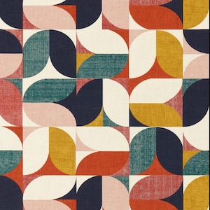 May include: Geometric pattern featuring a repeating design of rounded shapes in a variety of colors. The color palette includes navy, teal, mustard yellow, red, pink, and cream. The design has a mid-century modern aesthetic.