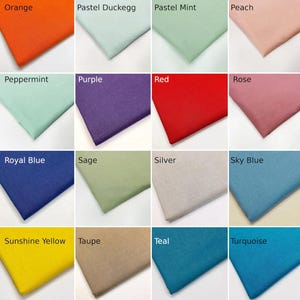 May include: A selection of fabric swatches in a range of colours. The swatches include orange, pastel duck egg, pastel mint, peach, peppermint, purple, red, rose, royal blue, sage, silver, sky blue, sunshine yellow, taupe, teal, and turquoise.