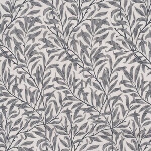 May include: A textile fabric featuring a repeating botanical pattern of dark grey willow branches and elongated leaves set against a light cream background. The design displays a dense, interconnected network of foliage with fine line details.