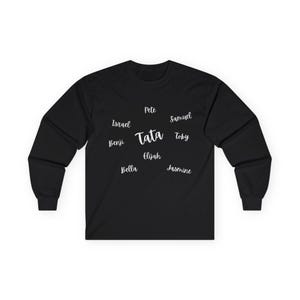 May include: Black long-sleeve shirt with the word "TATA" in the center, surrounded by names like Pete, Samuel, and Jasmine in a white, handwritten font. The shirt is made of a soft, comfortable material.