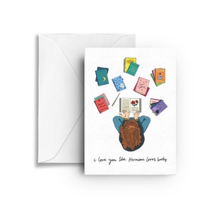 May include: A greeting card with a cartoon illustration of a person reading a book surrounded by other books. The text on the card reads "i love you like Hermione loves books".
