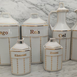 6-piece set of ancient spice jars / storage jars + vinegar and oil cruet / made of porcelain with gold rim / 1920s