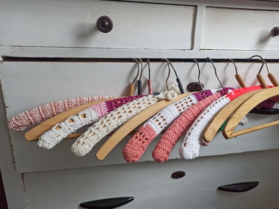 Pink wooden coat hangers hotsell