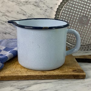 Light blue enamel pot / old ladle in sky blue / handled pot / enamel pot / vintage milk pot 1.5 liters