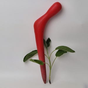 old plastic planting stick / garden tool / bulb planter / garden / dibbler / flower bulb / gardening / flowerbed