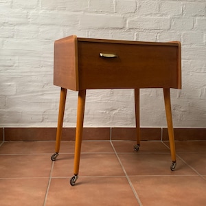 old side table / bedside table with wheels / sewing box on legs / Mid century / 1960s - bicolor