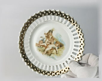 small decorative plate with cutout putti / decorative bowl / porcelain plate / soap dish / Ø 15 cm (5.9") / drip tray