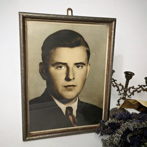 Old frame with picture, vintage wooden frame, photo, portrait