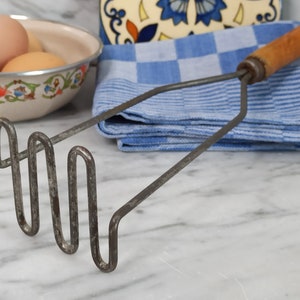 Vintage potato masher / kitchen utensils with wooden handle / rustic kitchen