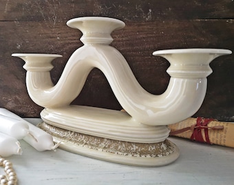 white candlestick made of porcelain with gold rim, candle holder, white, cream, gold, 3 flames